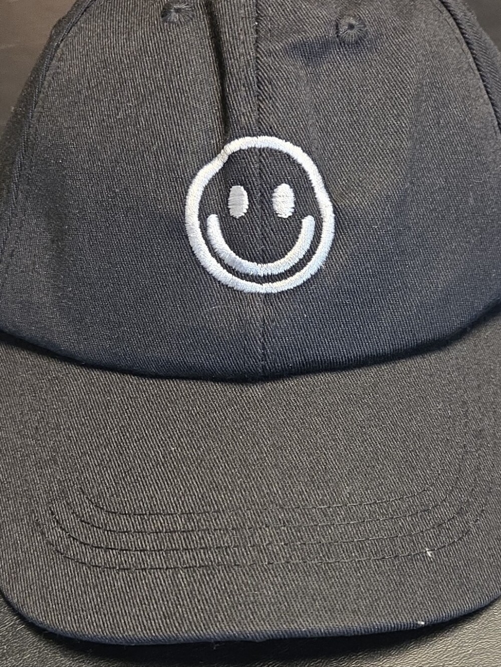 Black Baseball Cap with White Smiley Embroidery